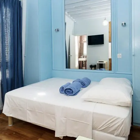 Апартаменты 4 Le Marais Place Des Vosges