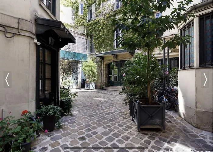 Апартаменты Le Marais - Steps From Place De Vosges Aldaro Париж